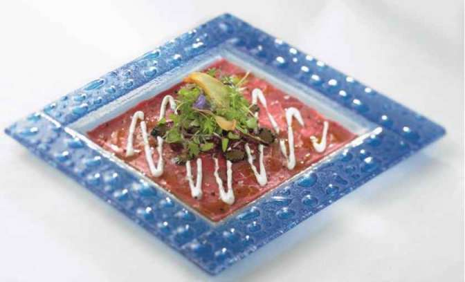 Een carpaccio van angus rund op de Celebrity Silhouette